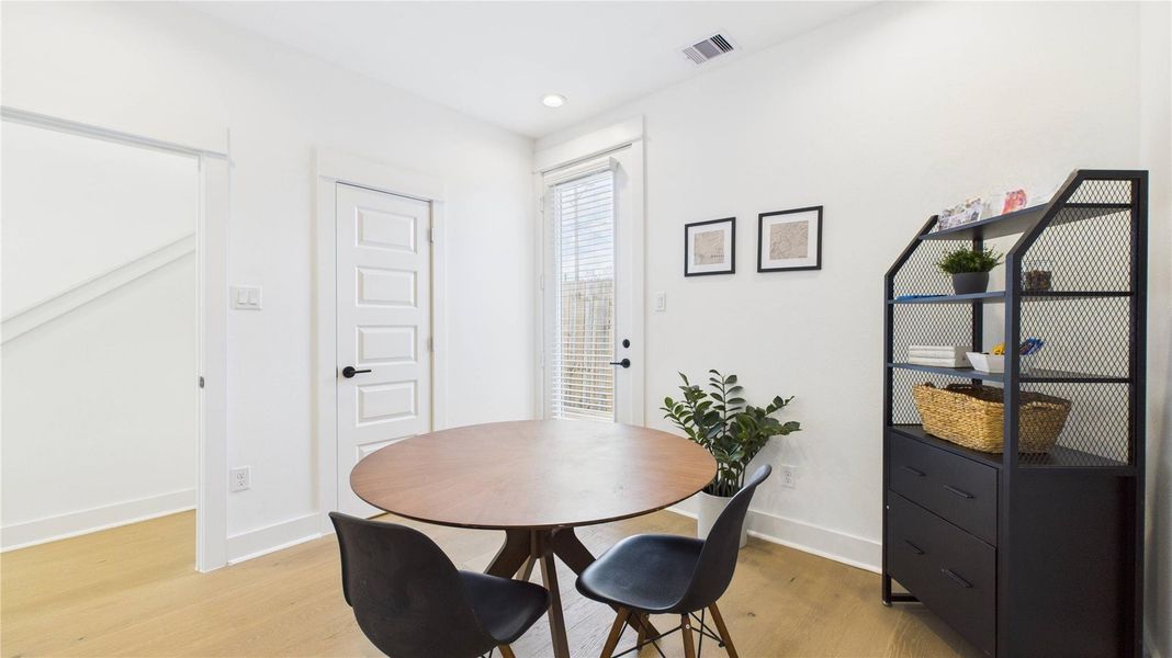 This first-floor secondary bedroom offers a private and convenient layout, featuring a spacious closet, a full ensuite bathroom, and direct access to the backyard ideal for guests or flexible everyday living.