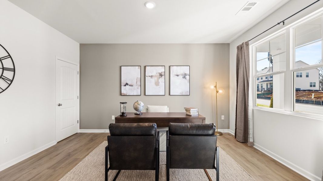 Representative furnished interior of a home built from the Elbert ll by D.R. Horton in Braselton Village, Braselton (Image 6).