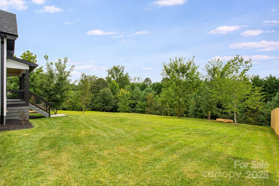 Front exterior of a new home in , Hendersonville, NC, highlighting curb appeal (Image 17).
