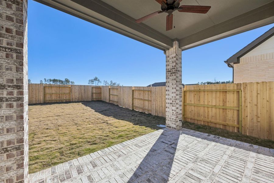 Exterior details and patio area of a home in Evergreen, Conroe (Image 20).