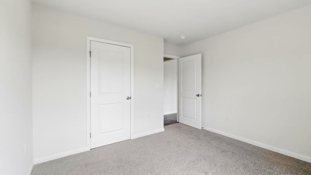Spacious, unfurnished interior of a new home in Treemont Commons, Wellford (Image 27).