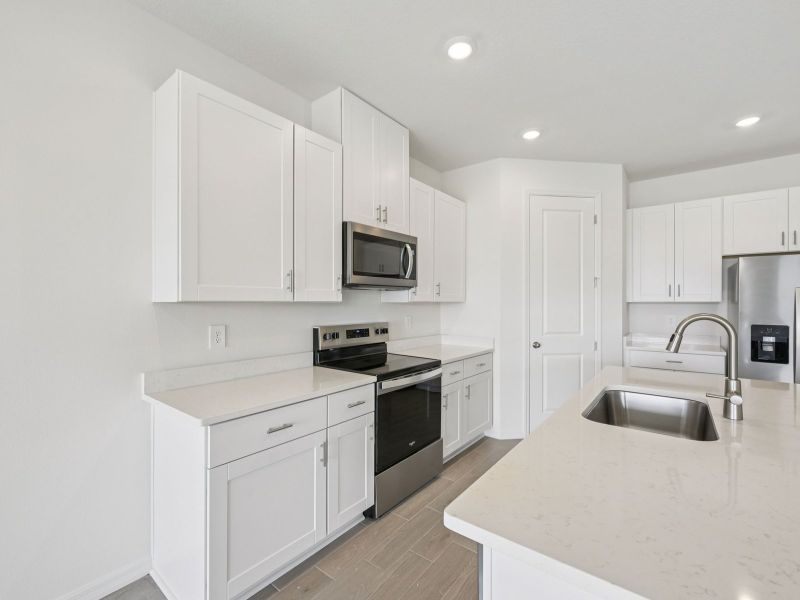 Furnished interior view inside a new home in Coasterra - Reserve Series, Palmetto (Image 6).
