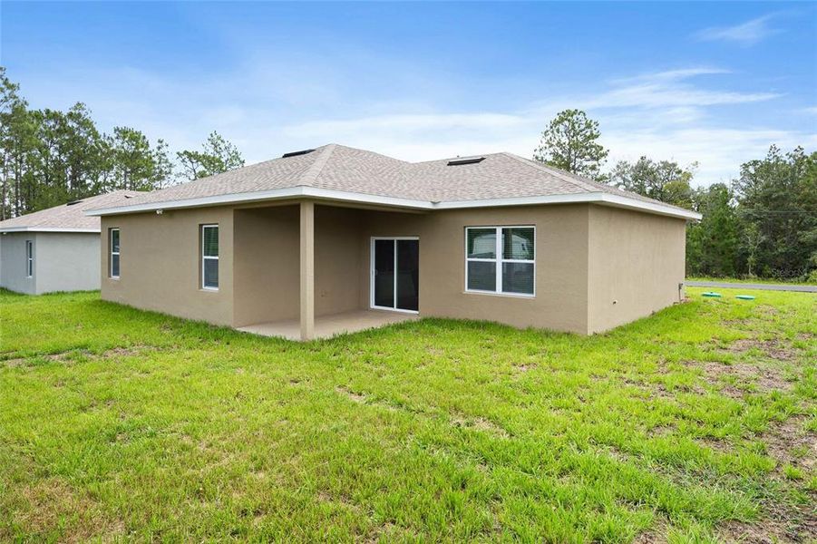 Front exterior of a new home in , Citrus Springs, FL, highlighting curb appeal (Image 19).