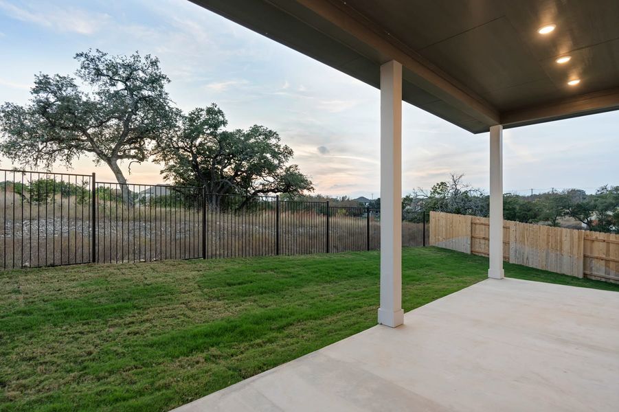 Exterior details and patio area of a home in Lariat, Liberty Hill (Image 31).
