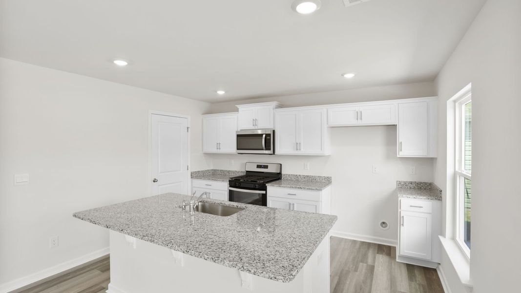 Furnished interior view inside a new home in Harrier Point, Woodruff (Image 9).