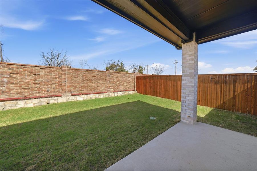 Exterior details and patio area of a home in Devonshire, Forney (Image 4).