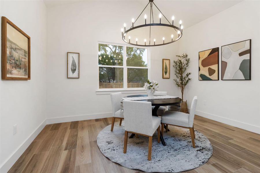 Dedicated dining area with cathedral ceiling Dedicated dining area with cathedral ceiling