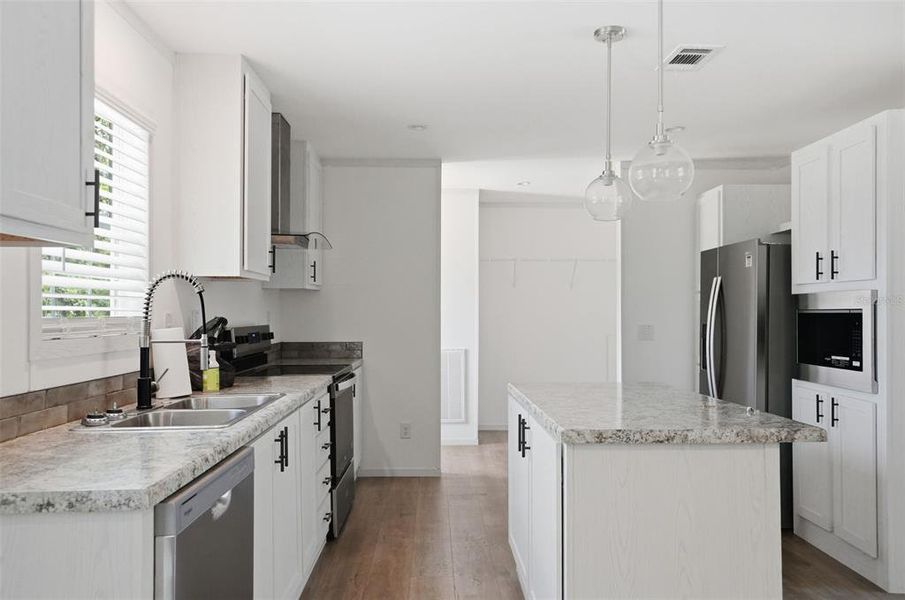 Furnished interior view inside a new home in , Weeki Wachee (Image 4).