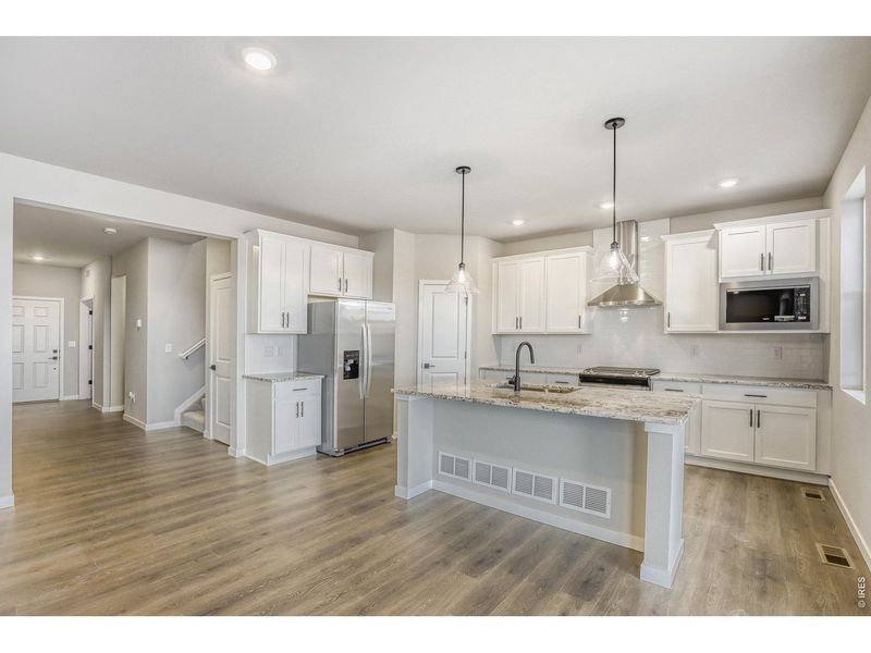 Furnished interior view inside a new home in Farmstead, Berthoud (Image 10).