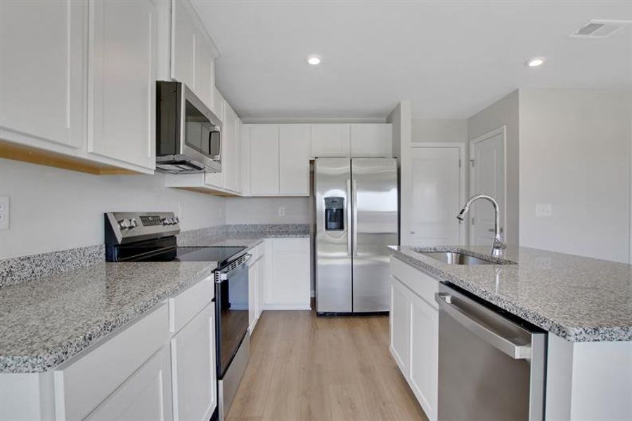 Furnished interior view inside a new home in Aspen Meadows, Hampton (Image 6).