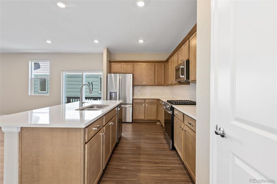 Furnished interior view inside a new home in Woodrose at Painted Prairie, Aurora (Image 9).
