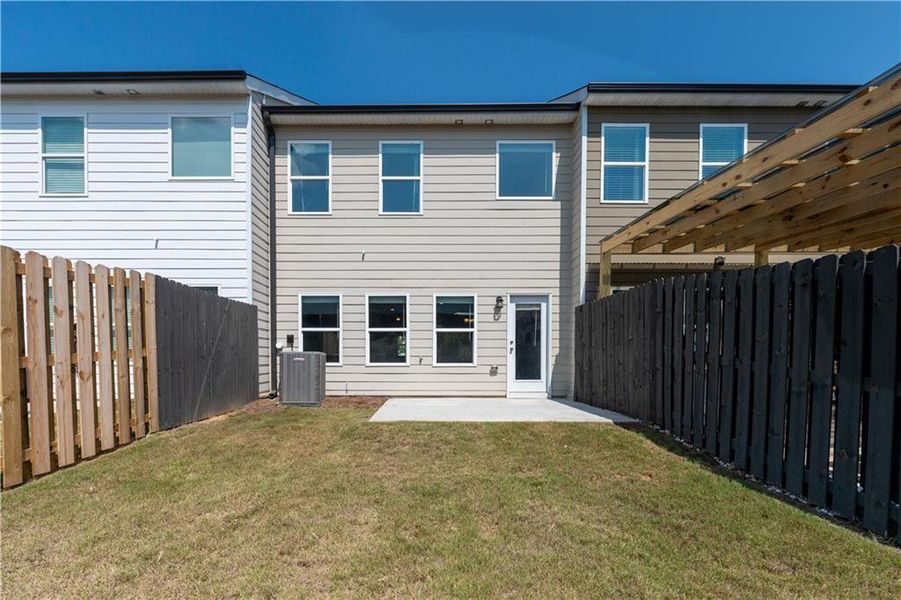 Front exterior of a new home in , Hoschton, GA, highlighting curb appeal (Image 2).
