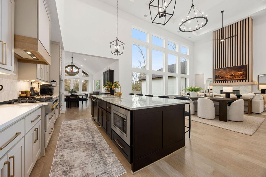 Any chef's dream, this stunning kitchen is perfect for everyday life as well as entertaining family and friends! Extra large kitchenisland is perfect for conversation or that much needed space to lay out your party spread for everyone to enjoy! Largewindows provide lovely views of your backyard and plenty of natural lighting throughout the day!