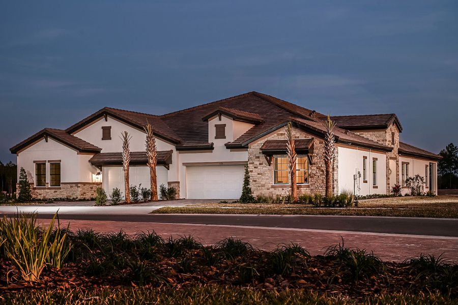 Representative exterior photo of a completed home built from the Vinoy by Homes by WestBay in Two Rivers, Zephyrhills, FL (Image 20).