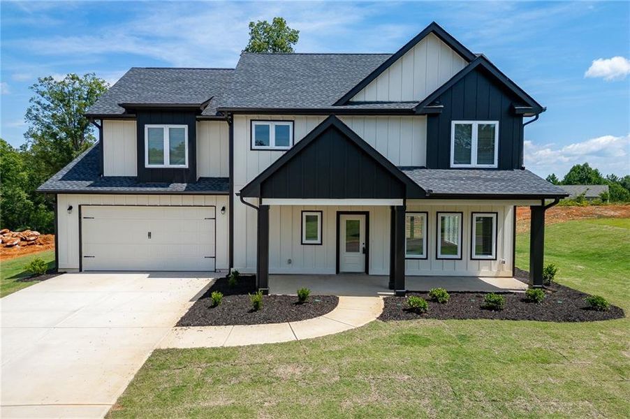 Front exterior of a new home in , Toccoa, GA, highlighting curb appeal (Image 30). Front exterior of a new home in , Toccoa, GA, highlighting curb appeal (Image 30).