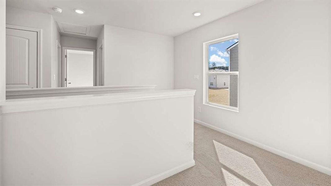 Furnished interior view inside a new home in Mableton Station, Mableton (Image 1).