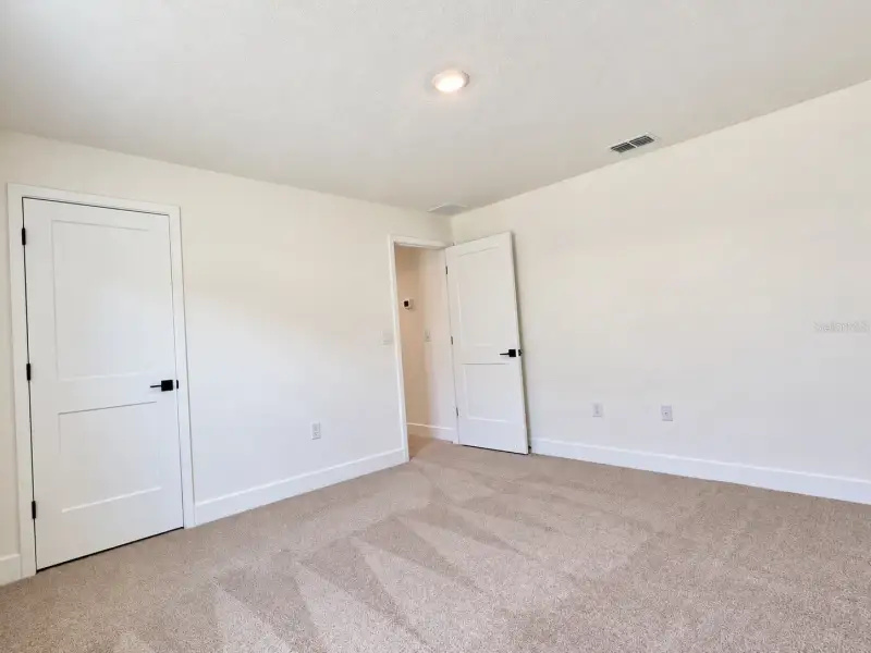 Spacious, unfurnished interior of a new home in Harmony Central, Harmony (Image 12).