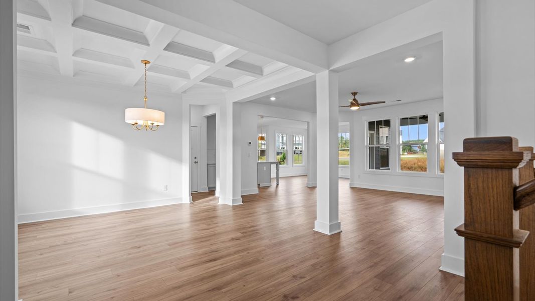 First-class entryway featuring hardwood floors and accomplished architectural style