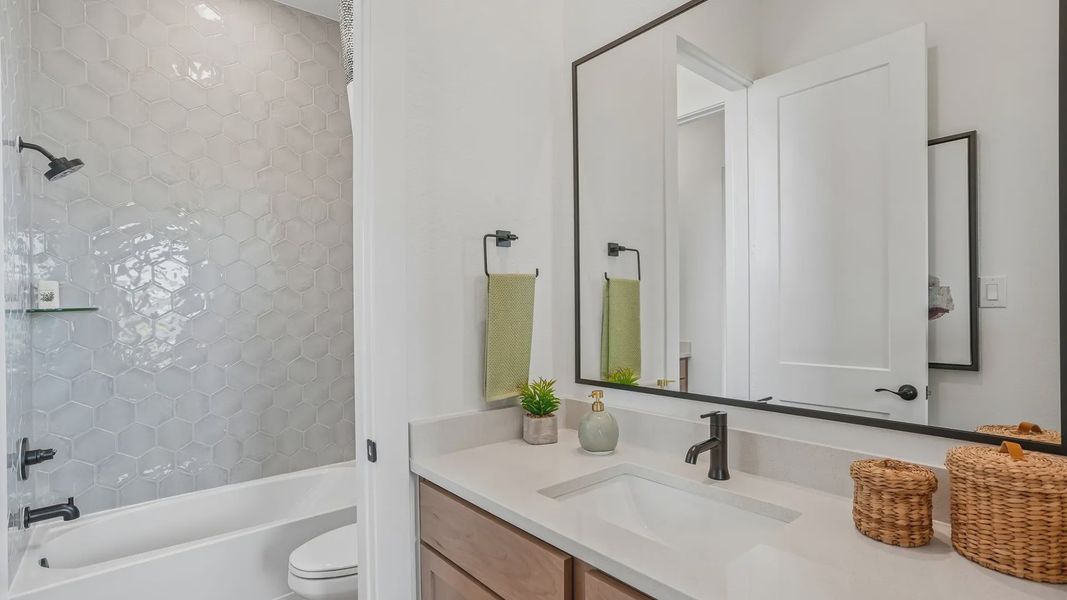 Representative furnished interior of a home built from the Sydney by Chesmar Homes in Westland Ranch, League City (Image 36).