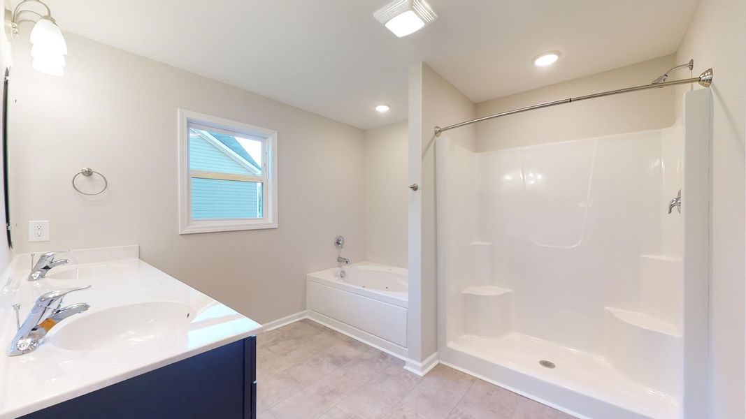 Representative furnished interior of a home built from the Westin A by JC Jackson Homes,LLC in Heritage Pointe, Newport (Image 10).
