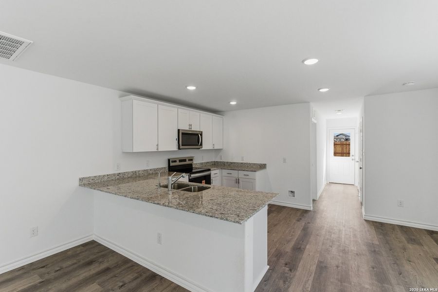 Furnished interior view inside a new home in Horizon Ridge, San Antonio (Image 8).