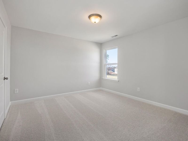 Spacious, unfurnished interior of a new home in Tobacco Road, Angier (Image 42).