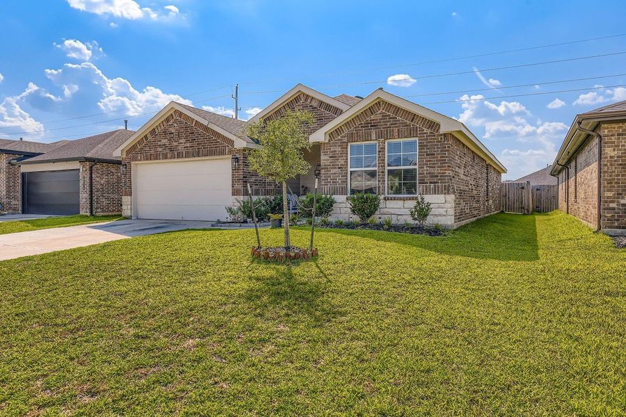 Front exterior of a new home in , Katy, TX, highlighting curb appeal (Image 19). Front exterior of a new home in , Katy, TX, highlighting curb appeal (Image 19).
