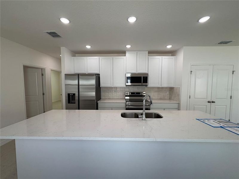 Furnished interior view inside a new home in Lake Deer Estates, Poinciana (Image 3).