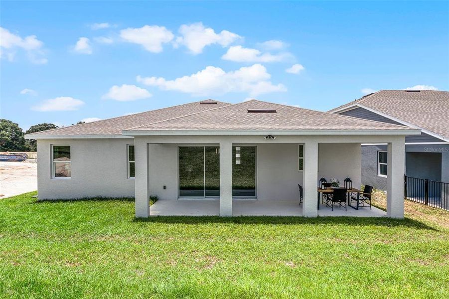 Exterior details and patio area of a home in Eden Crest, Apopka (Image 3). Exterior details and patio area of a home in Eden Crest, Apopka (Image 3).