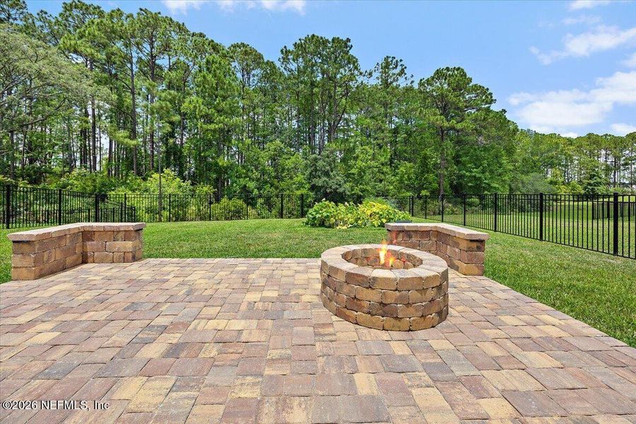 Exterior details and patio area of a home in Edenbrooke at Hyland Trail | 55+, Green Cove Springs (Image 17).