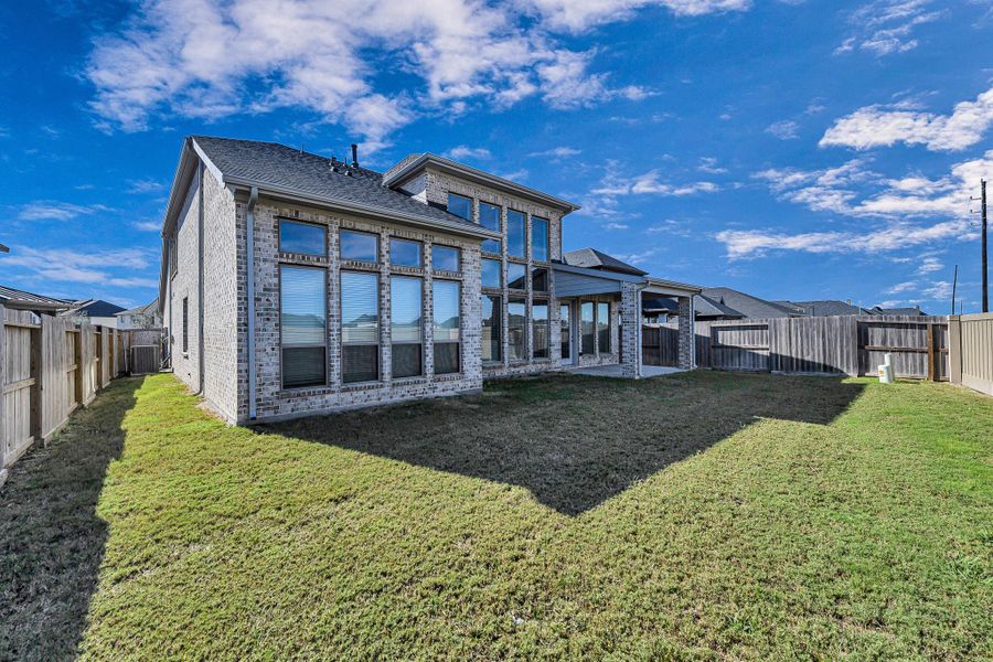 Exterior details and patio area of a home in Cross Creek West 55', Fulshear (Image 26). Exterior details and patio area of a home in Cross Creek West 55', Fulshear (Image 26).