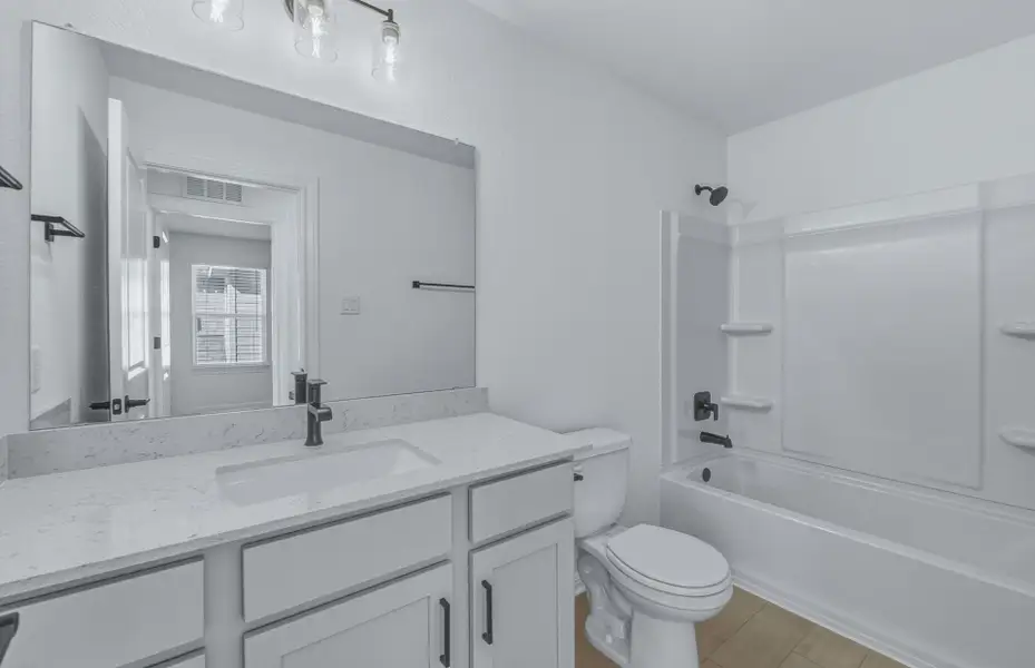 Furnished interior view inside a new home in Horizon Lake, Leander (Image 6).