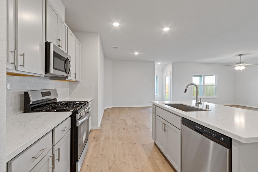 Furnished interior view inside a new home in Sunterra, Katy (Image 7).