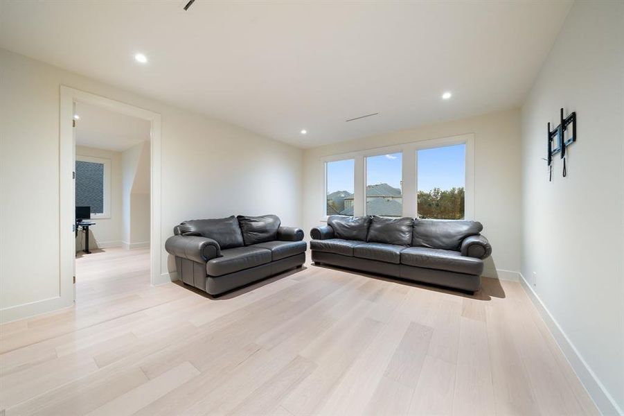 The game will be fun-central with large sunny windows and plenty of space for a pool table or gaming station!