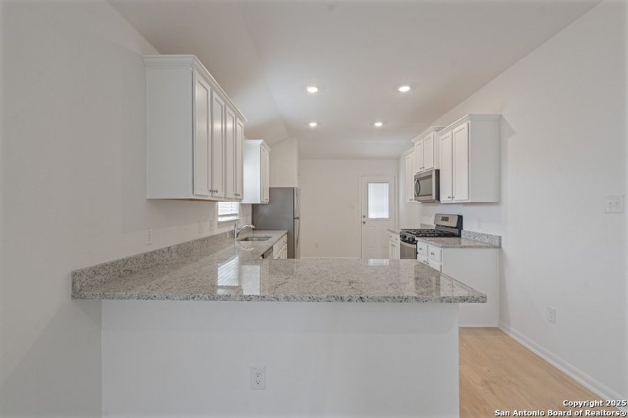 Furnished interior view inside a new home in Luckey Ranch, San Antonio (Image 2).