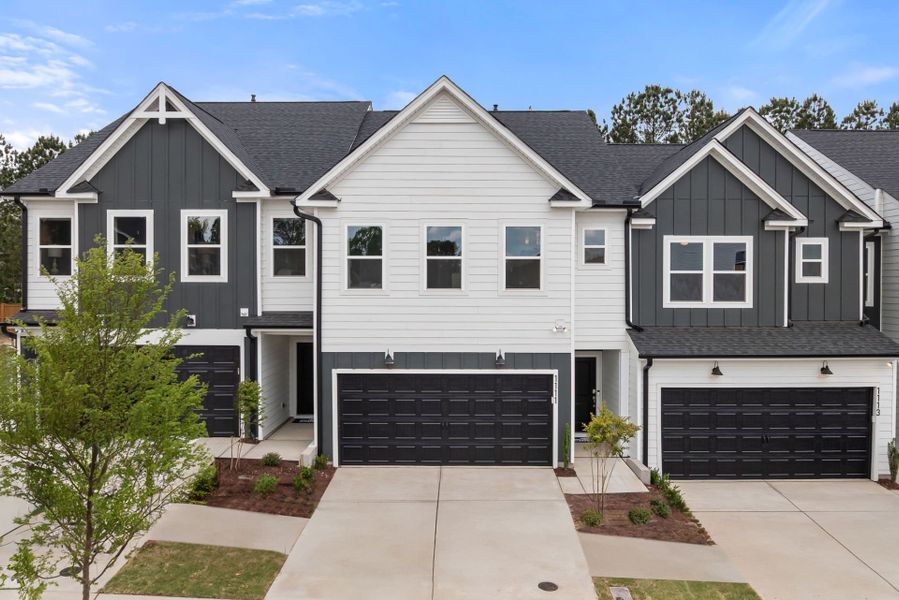 Front exterior of a new home in Everton, Durham, NC, highlighting curb appeal (Image 1). Front exterior of a new home in Everton, Durham, NC, highlighting curb appeal (Image 1).