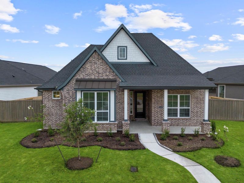 Front exterior of a new home in Riceland, Mont Belvieu, TX, highlighting curb appeal (Image 25).