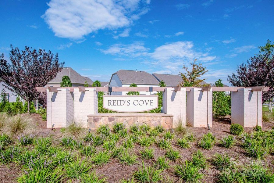 Front exterior of a new home in Signature at Reid's Cove, Mooresville, NC, highlighting curb appeal (Image 18).