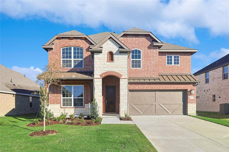 Front of property featuring a garage, a front lawn, and cooling unit