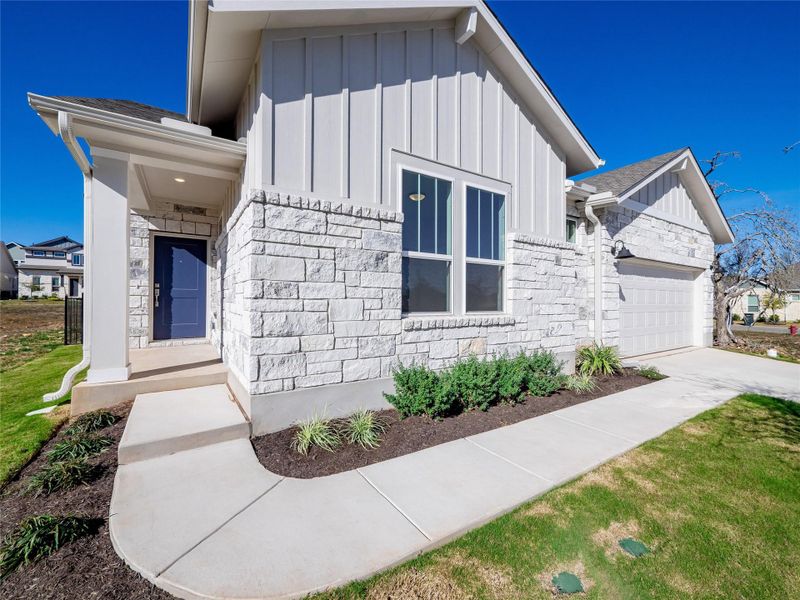 Exterior details and patio area of a home in Anthem Cottages, Kyle (Image 24).