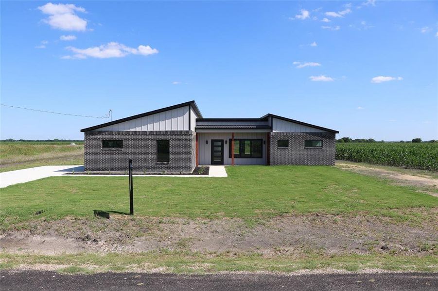 Front exterior of a new home in , Avalon, TX, highlighting curb appeal (Image 1). Front exterior of a new home in , Avalon, TX, highlighting curb appeal (Image 1).