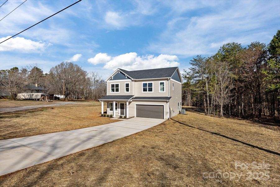 Front exterior of a new home in , Lincolnton, NC, highlighting curb appeal (Image 30).