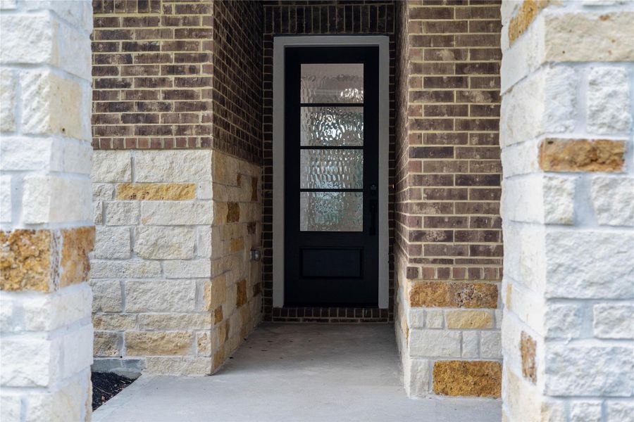 Exterior details and patio area of a home in Timber Hollow, Magnolia (Image 3).