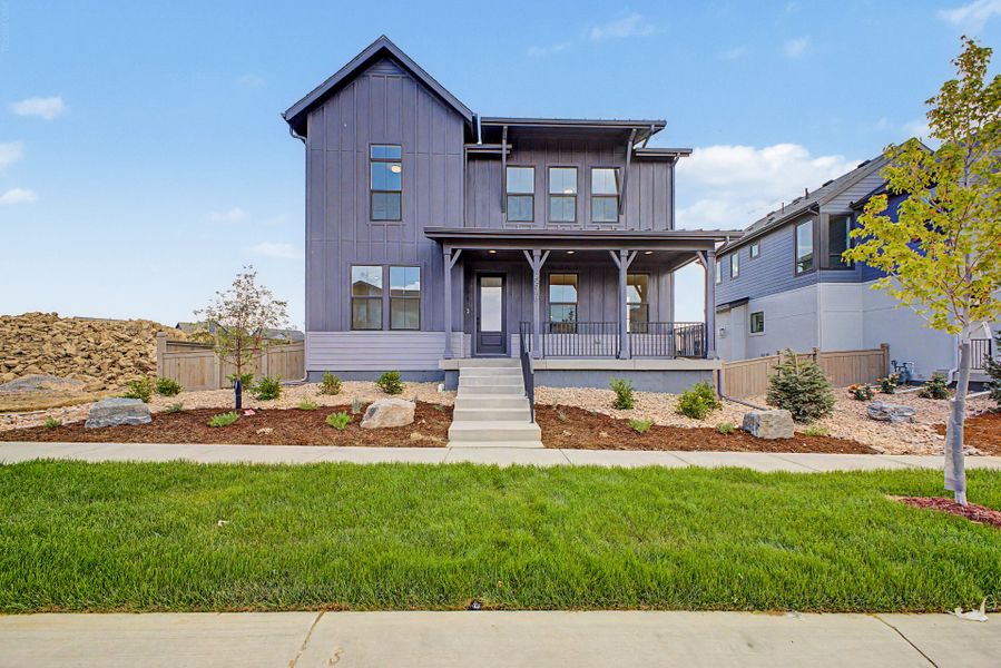 Front exterior of a new home in West Grange, Longmont, CO, highlighting curb appeal (Image 1). Front exterior of a new home in West Grange, Longmont, CO, highlighting curb appeal (Image 1).