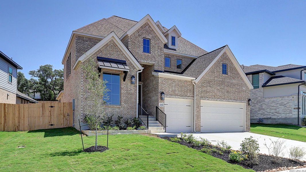 Front exterior of a new home in The Ranches at Creekside, Boerne, TX, highlighting curb appeal (Image 1). Front exterior of a new home in The Ranches at Creekside, Boerne, TX, highlighting curb appeal (Image 1).