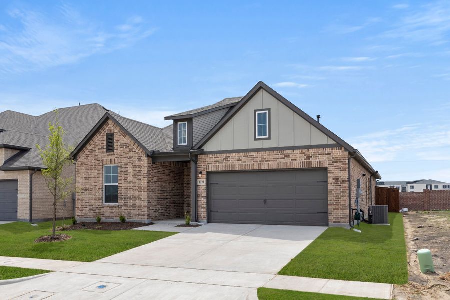 Representative exterior photo of a completed home built from the Patriot by Rockwell Homes in Creekside, Royse City, TX (Image 34). Representative exterior photo of a completed home built from the Patriot by Rockwell Homes in Creekside, Royse City, TX (Image 34).