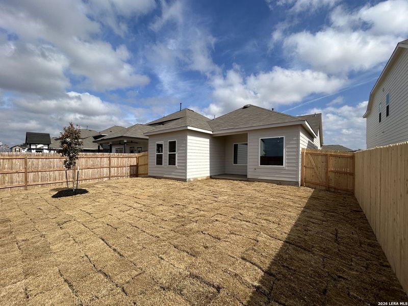 Exterior details and patio area of a home in Hennersby Hollow, San Antonio (Image 22).