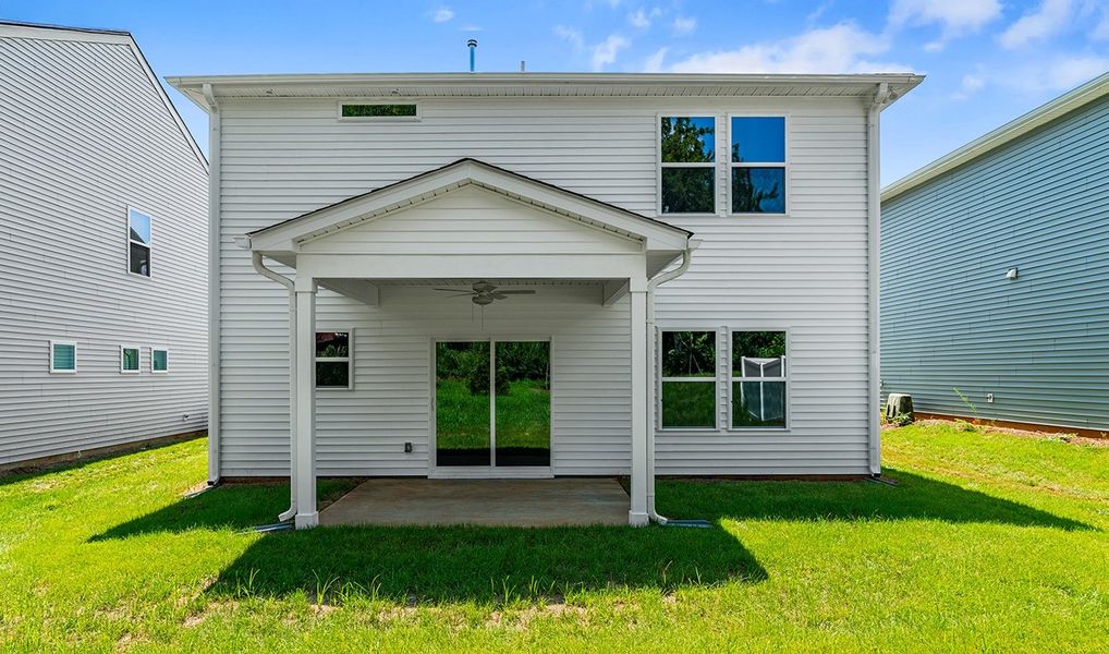 Front exterior of a new home in Hanes Lake, Winston-Salem, NC, highlighting curb appeal (Image 26). Front exterior of a new home in Hanes Lake, Winston-Salem, NC, highlighting curb appeal (Image 26).