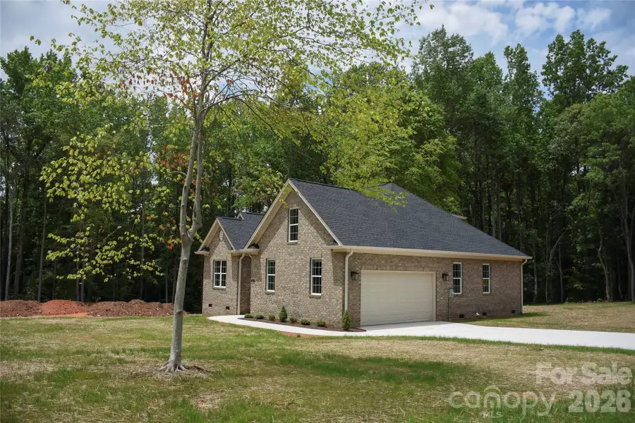 Front exterior of a new home in , Bessemer City, NC, highlighting curb appeal (Image 2). Front exterior of a new home in , Bessemer City, NC, highlighting curb appeal (Image 2).