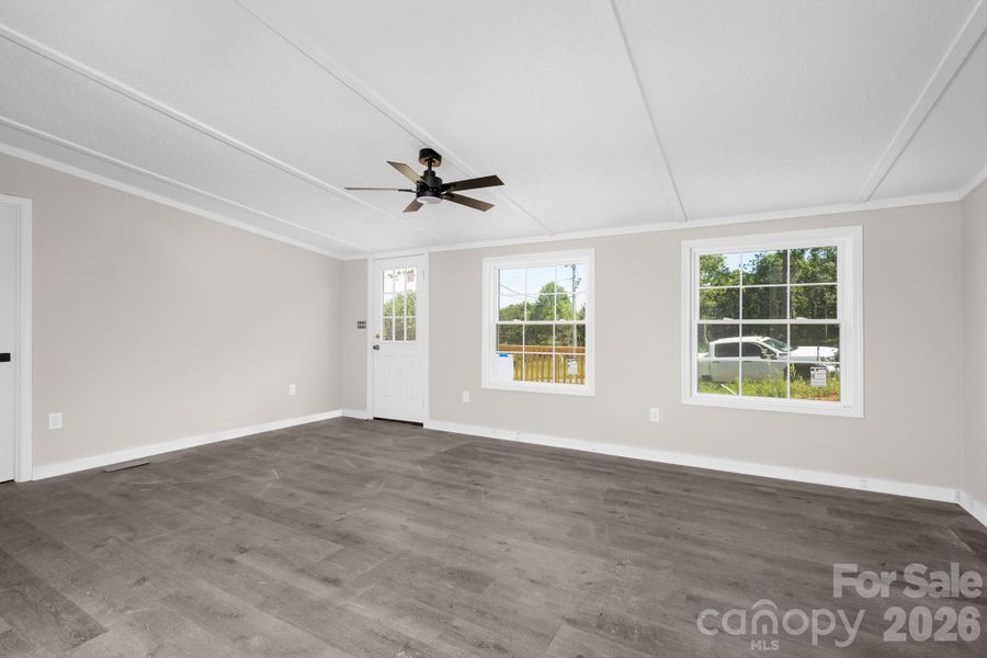 Spacious, unfurnished interior of a new home in , Vale (Image 18).